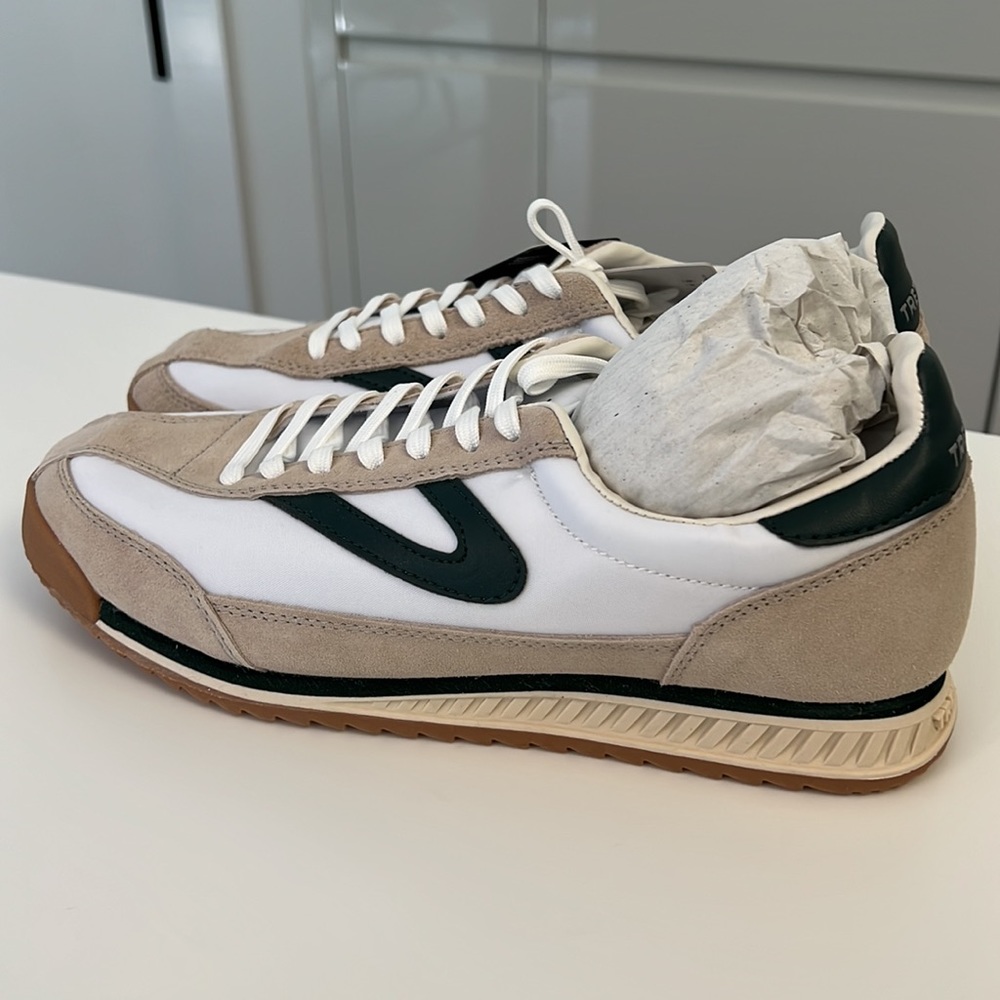 Brand new Tretorn sneakers color white/green. Gorgeous for fall.